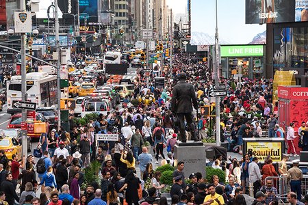 A crowd in Times Square last month