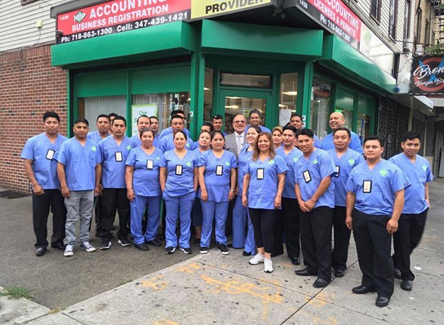 The undocumented immigrants accusing Edwin Rivera of taking their money claim they donated food and volunteered for a charity last year to get green cards, shown in this photo they provided Attorney Anibal Romero.