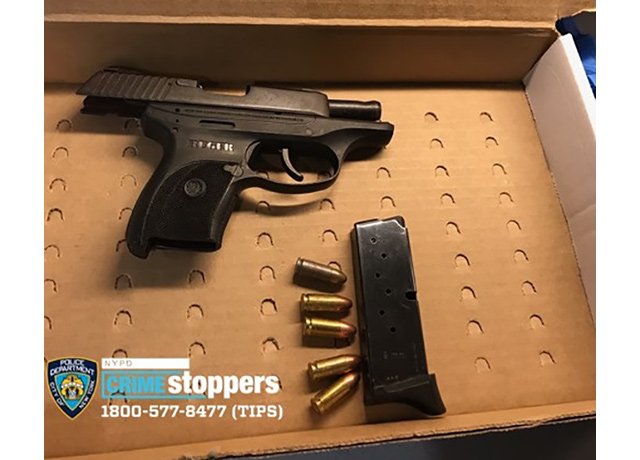 A photograph of the suspect's gun