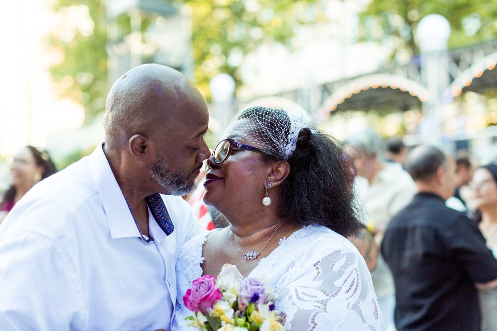 A couple kisses.
