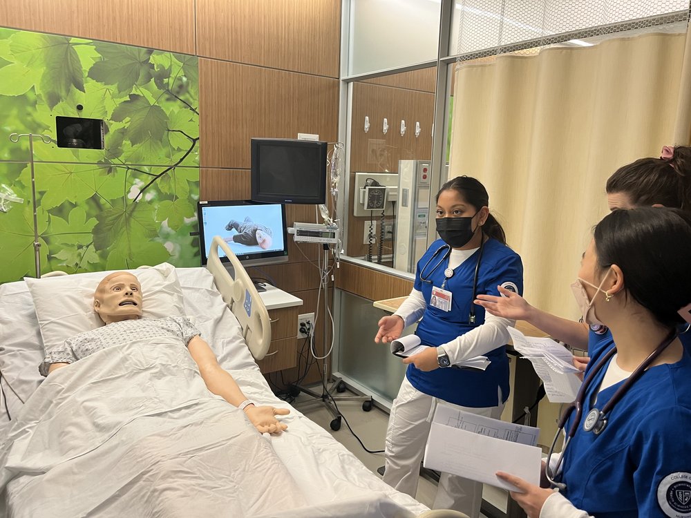 A student at the SUNY Downstate College of Nursing in Brooklyn talks about the proper protocol for examining a patient with asthma at the school’s simulation lab. At the height of the pandemic, nurses couldn’t do in-person simulations or clinical placements, but training has since returned to normal.