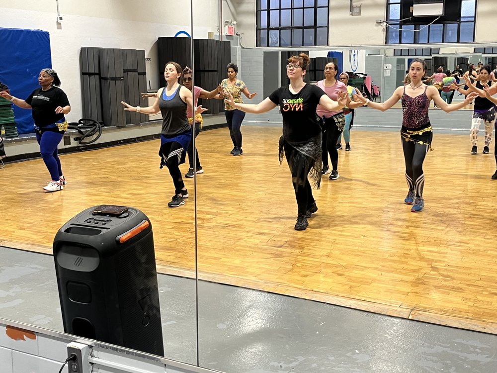 Kaitlin Hines-Vargas teaches a belly dance workout known as SharQui at the Highbridge Recreation Center in Washington Heights.