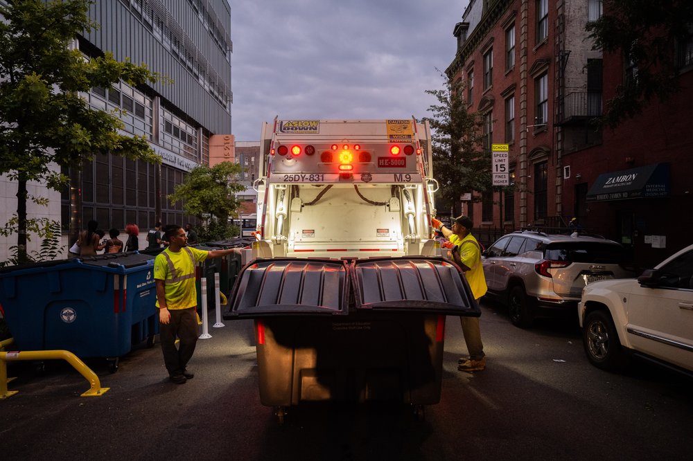 The Sanitation Department modified some trucks from its existing fleet to empty the new bins with a mechanical lift. Photo taken Aug. 16, 2023.