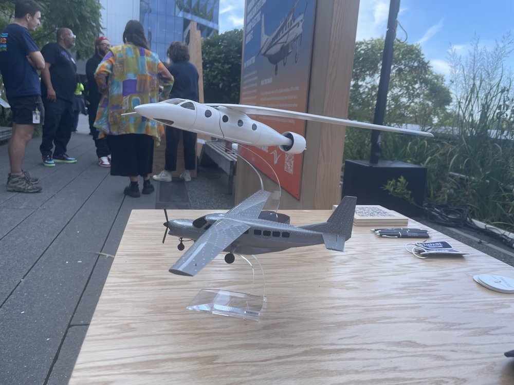 Ampaire is creating hybrid electric jet planes that can travel up to 1,200 miles (about the distance from NYC to Miami). Founder and CEO Kevin Noertker said these planes could cut emissions up to 70%. The models are on display at the Climate Science Fair.