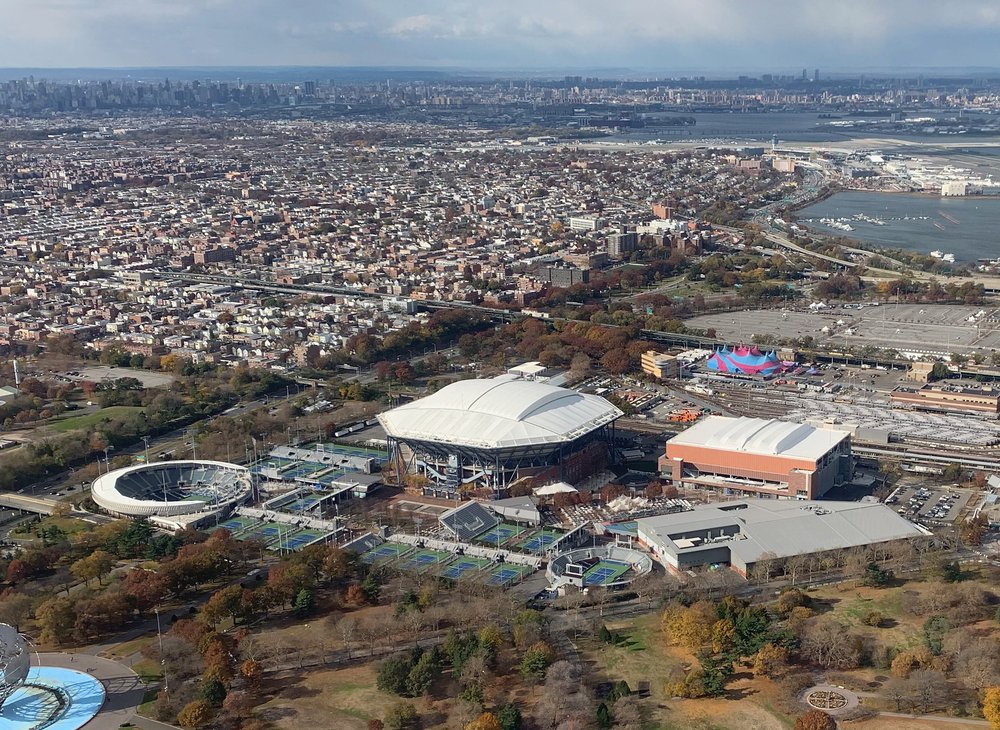This aerial view shows Arthur Ashe Tennis Stadium and LaGuardia Airport (top right) on Nov. 10, 2018 in Queens. A new NASA study shows the airport and the stadium rank among the fastest sinking areas in New York City due to being constructed on landfills.