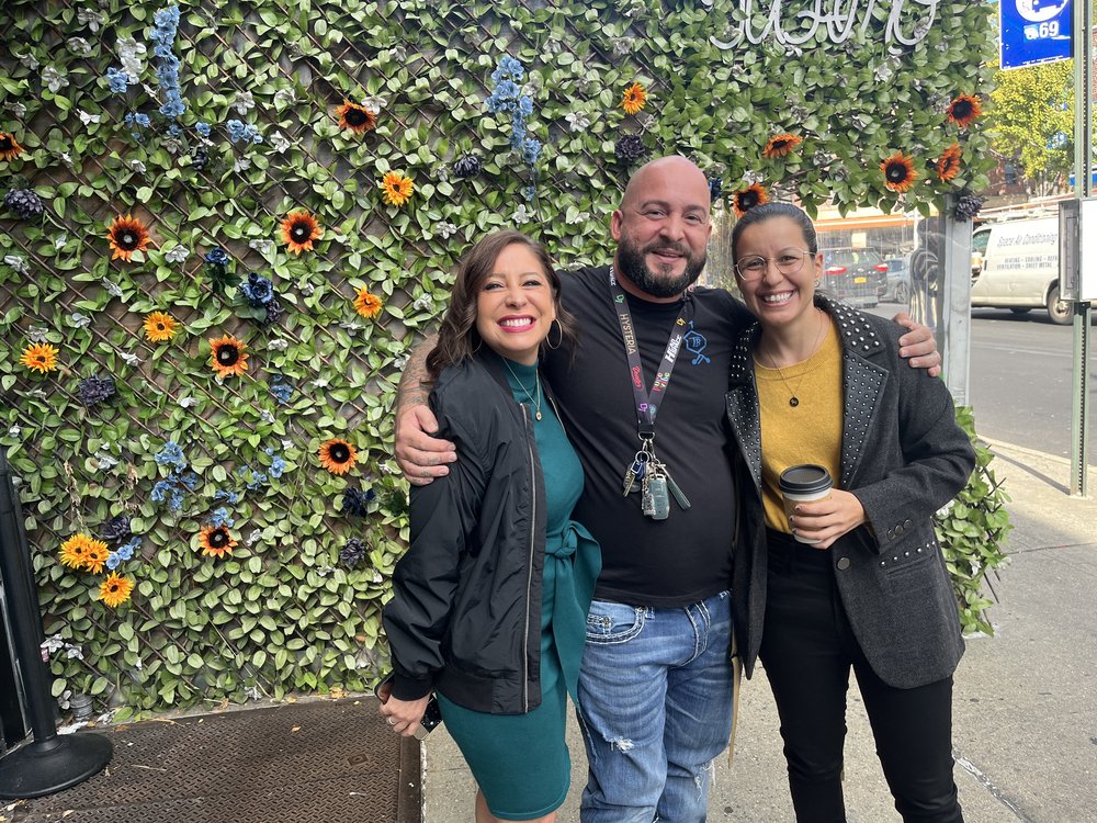 Jeremy Rivera (center) celebrates the opening of his new dispensary in Astoria with Assemblymember Jessica González-Rojas and City Councilmember Tiffany Cabán.