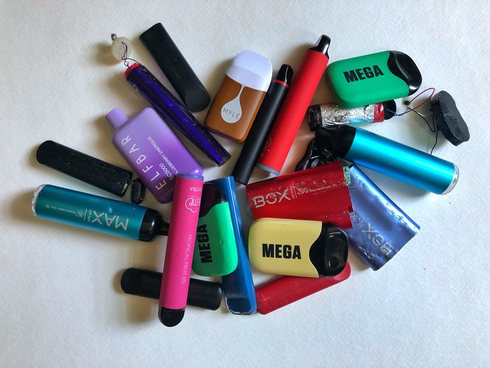 Pile of discarded vape pens found littering the streets in New York City.