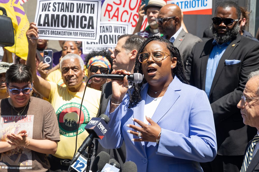 Rep. LaMonica McIver speaks with supporters outside federal court in Newark Wednesday. McIver pleaded not guilty to charges stemming from a May 9 incident outside a private immigration detention center in the city.