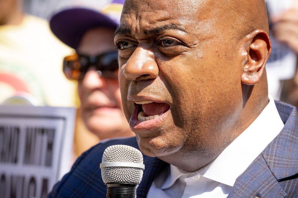 Newark Mayor Ras Baraka speaks in support of Rep. LaMonica McIver at the rally outside a federal courthouse.