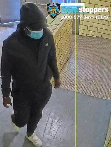 A surveillance image of one of the men who police say robbed a woman at a NYCHA building on Aug. 11, 2025