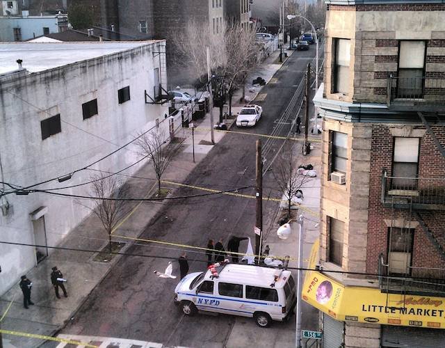 Photograph of detectives at the scene