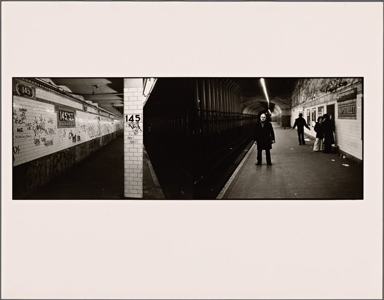 A black and white photo of people standing on a subway platform, with another impossibly nearby.