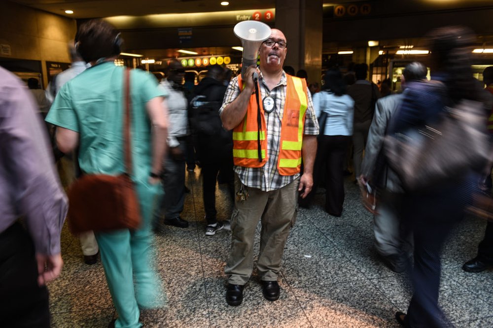 231e2221fgettyimages-811892788-jpg.jpeg Commuters transfer from Long Island railroad service to a New York City subway at the Barclays Center subway station on July 10, 2017 (Getty Images)