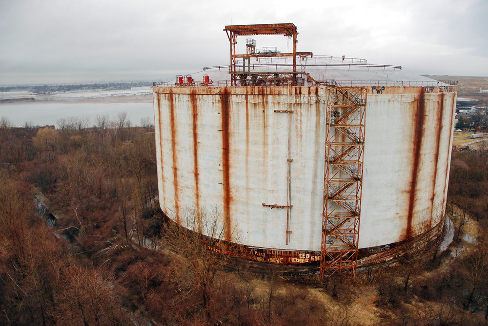 One of the liquid natural gas tanks, at the edge of the Rossville Municipal Site, as seen in 2012. The tanks are each 120 feet tall and 270 feet in diameter. The structures have been empty and unused since their completion in 1974.