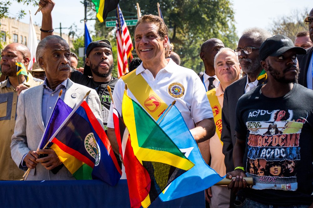 257c239b5westindian-12-jpg.jpeg Governor Andrew Cuomo with the Rev. Al Sharpton on the left<br>