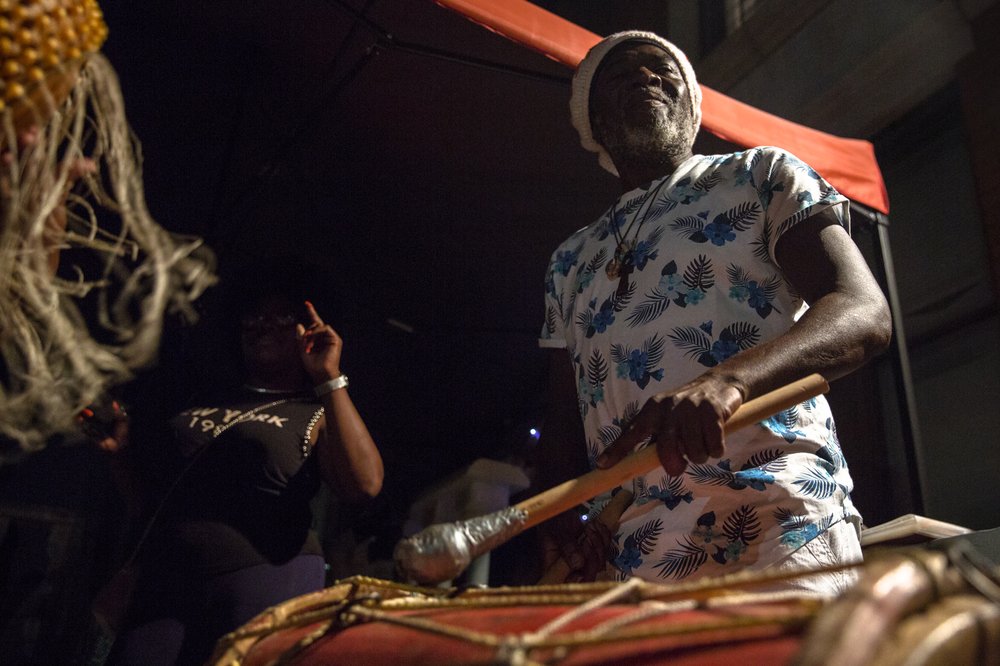James Alleyne plays the Tassa Bass drum at an evening Kutters Rhythm Section practice last Thursday in East Flatbush.