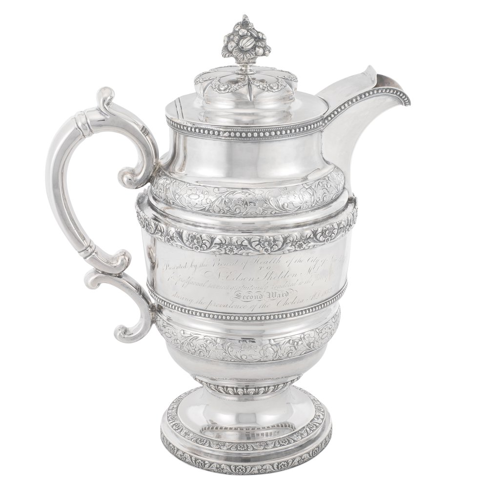 26a73d6c7germcity_1-jpg.jpeg Covered ewer presented to Dr. N. Edson Sheldon by the Board of Health of New York City for professional services gratuitously rendered to the poor of the Second Ward during the prevalence of the Cholera A.D. 1832. (Silver, made by Joseph Moseley and William Gale
Museum of the City of New York, 74.155)