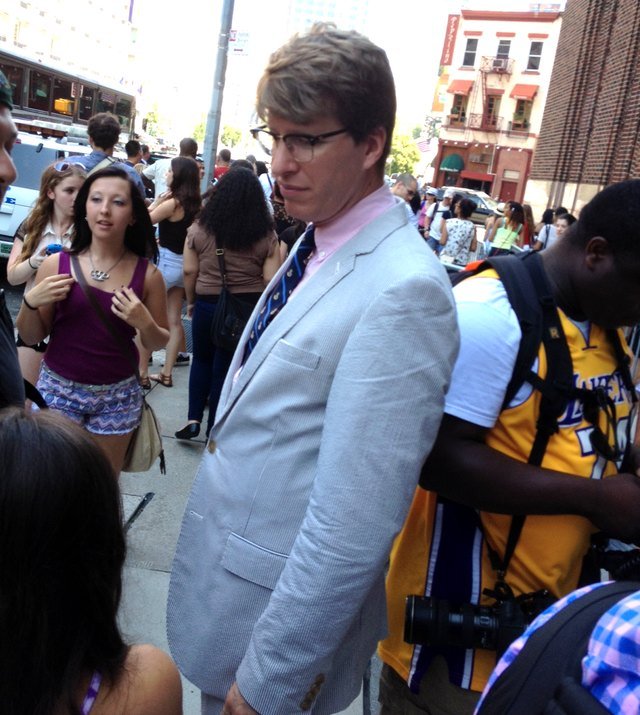 Hipster Cop with some Beliebers. (Photo by Tien Mao/Gothamist)