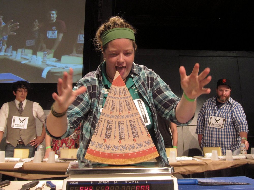 302a5a88a.jpeg Caitlin O'Neill weighs her cheese<br>