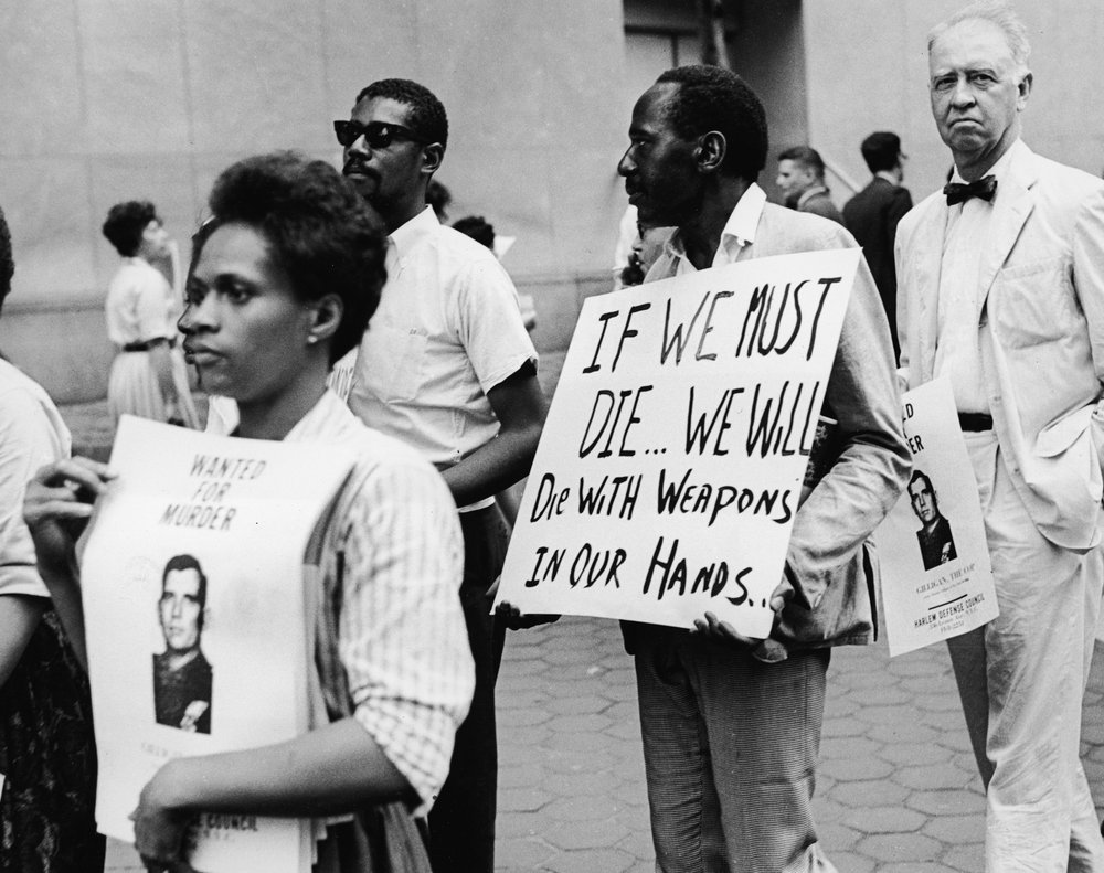 30bd8e3f0.jpeg "Demonstrators carrying placards protest against the murder of James Powell, a 15-year old black teenager who was shot by a policeman, July 23, 1964."