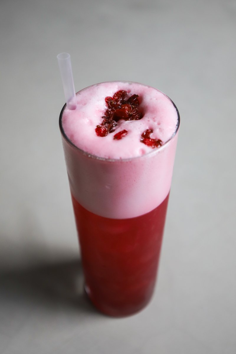 Zereshk Sour: bourbon, beet reduction, housemade zereshk syrup, egg white, lemon<br/>