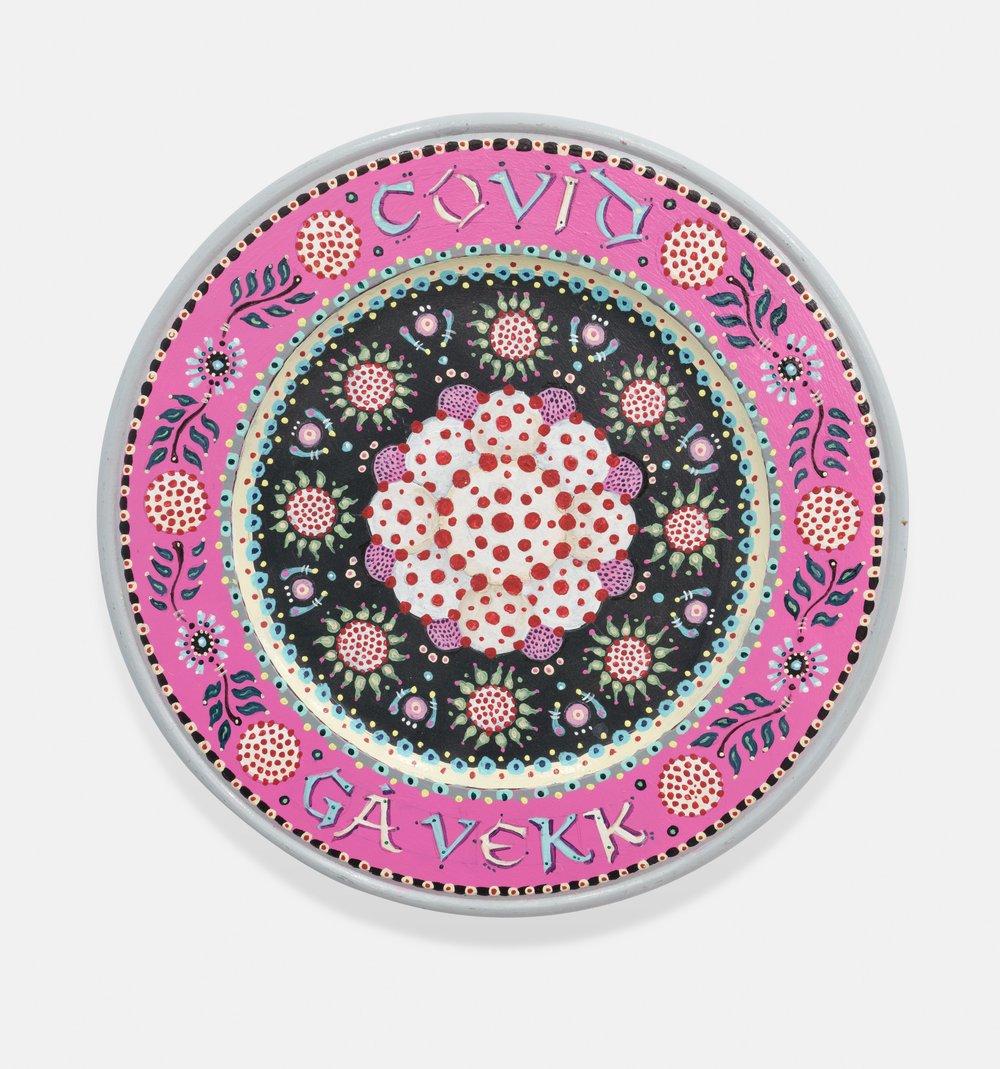 A plate with a pink border.