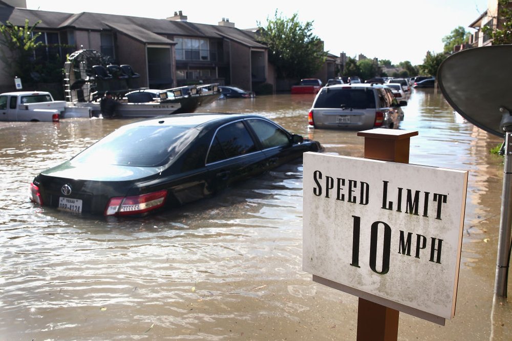 38264178dgettyimages-840995328-jpg.jpeg Cars sit along the street in an apartment complex after it was inundated with water following Hurricane Harvey.<br>