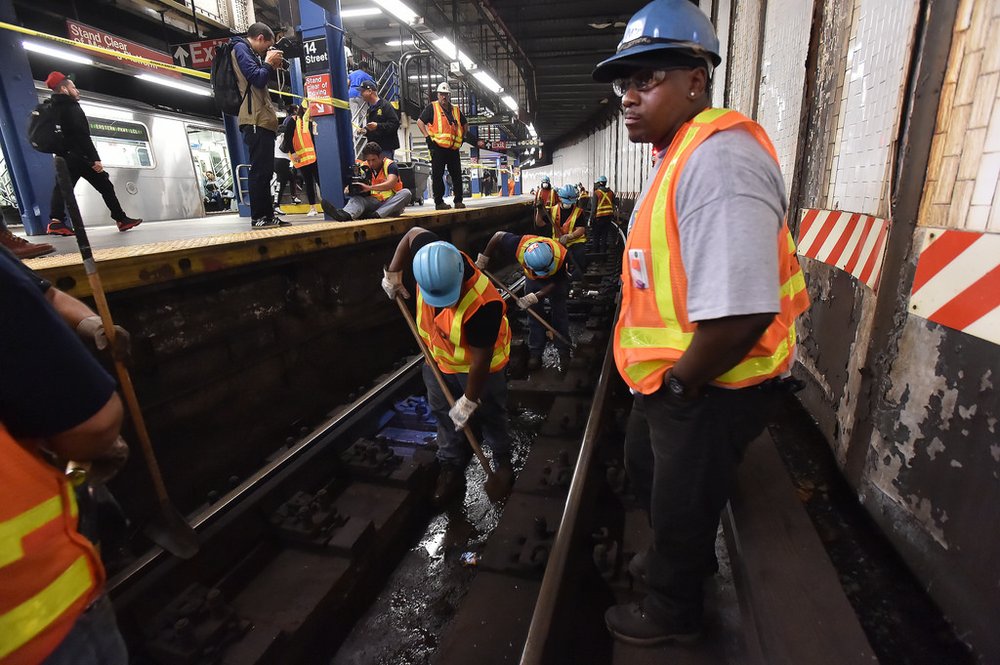 38b231ca936914588832_7d97bf05a9_b-jpg.jpeg With MTA workers<br>