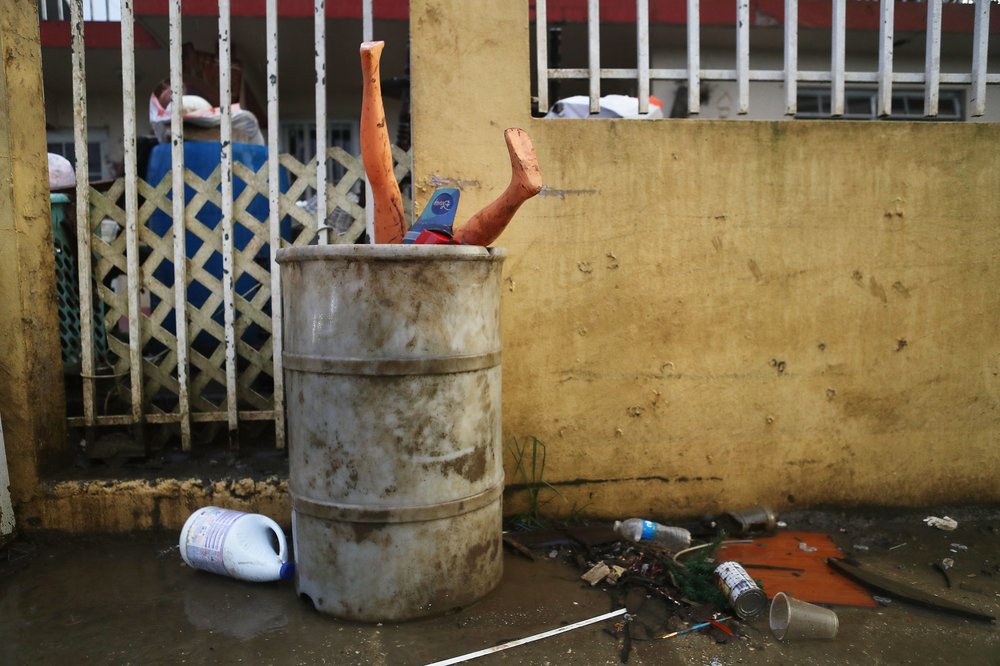 A mannequin and other items and debris are discarded on a sidewalk on October 16, 2017 in Toa Baja, Puerto Rico. <br/>