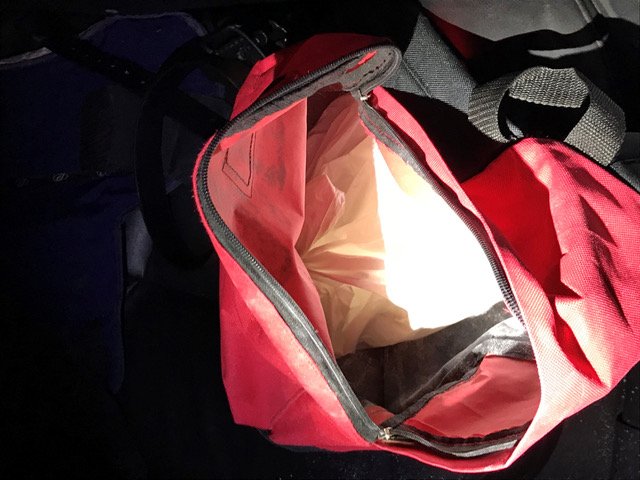 46aa14a3cloring-1-jpeg.jpeg A photo of a bag containing a kilo of drugs recovered by police along West Fordham Road. (Photo courtesy of the NYPD)