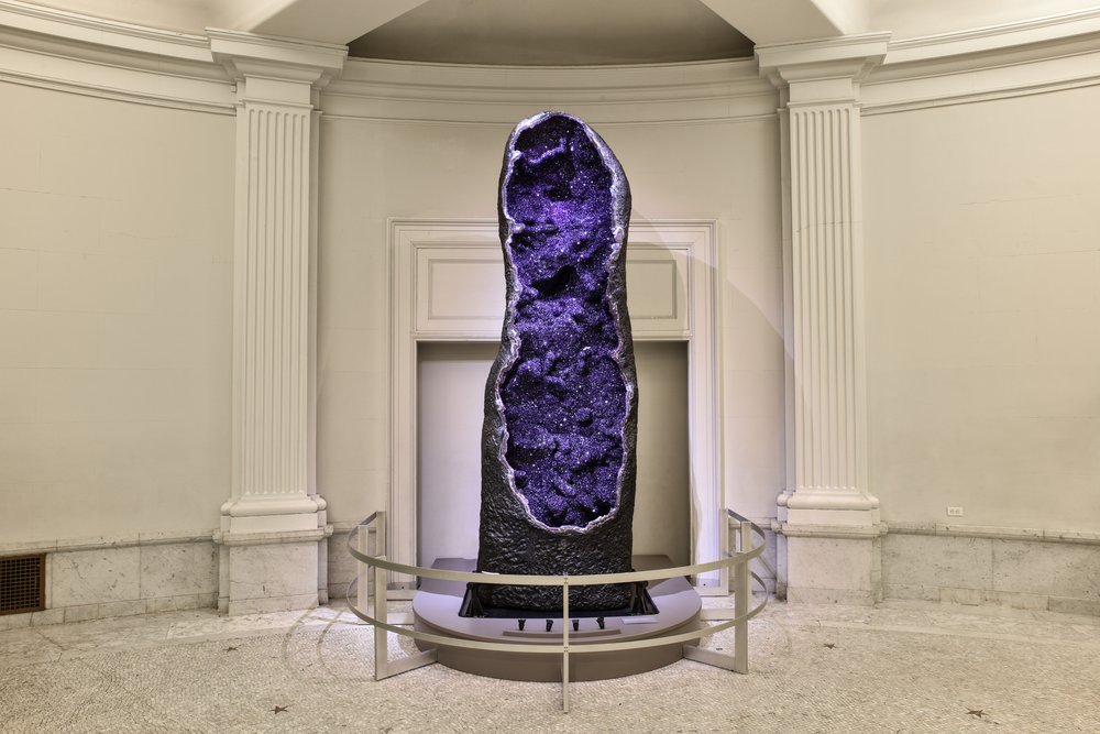 48c4194bf10a-amethyst-geode_df-jpg.jpeg The new Allison and Roberto Mignone Halls of Gems and Minerals will feature a sparkling 12-foot-tall amethyst geode, on temporary view in the Museum’s Grand Gallery through the 2017 holiday season. This geode, which weighs more than 9,000 pounds and is among the world’s largest, was recently collected in the Bolsa Mine in Uruguay. (© AMNH/D. Finnin)