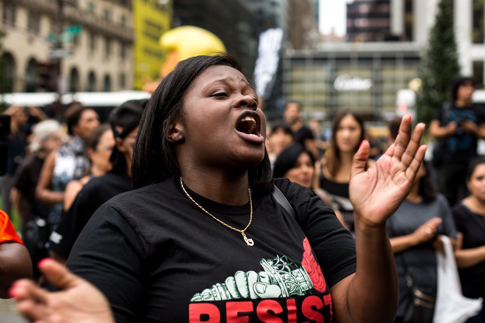 4b4d31d2d081317trumptowerprotest-4-jpg.jpeg Cynthia Norris lead a chant of "Black lives, they matter here!" as the rally against President Donald Trump's visit to Trump Tower began.</br>