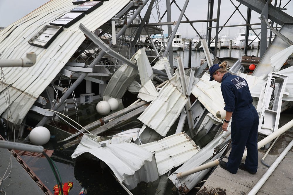 4ddbb1595092517gettypuertorico9-jpg.jpeg U.S. Coast Guard MST-2 Annaliese Ennis surveys the damage to a marina after Hurricane Maria passed through the area on Saturday, September 23rd in San Juan, Puerto Rico. (Joe Raedle/Getty Images)