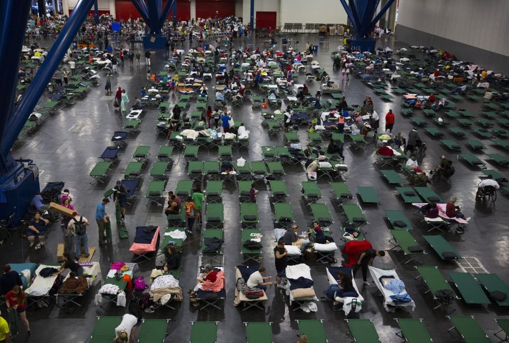 4e4770987gettyimages-840312260-jpg.jpeg Evacuees fill up cots at the George Brown Convention Center that has been turned into a shelter run by the American Red Cross to house victims of the high water from Hurricane Harvey on August 28, 2017 in Houston, Texas<br>