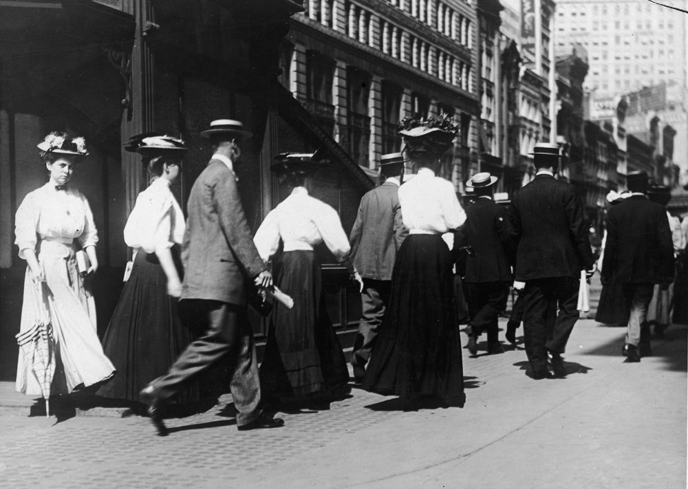 4f78b5198gettyimages-51156908-jpg.jpeg Commuters walk on the street after leaving a subway station, New York, 1910s. (Getty)<br/>