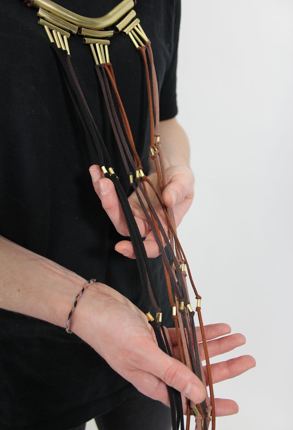 4fff1470c22184489eimg_9484-jpg-jpg.jpeg Alejandro Moyano designed a "Rosary Bead" necklace where people tie knots for every day loved ones are gone and reflect on their absence<br>