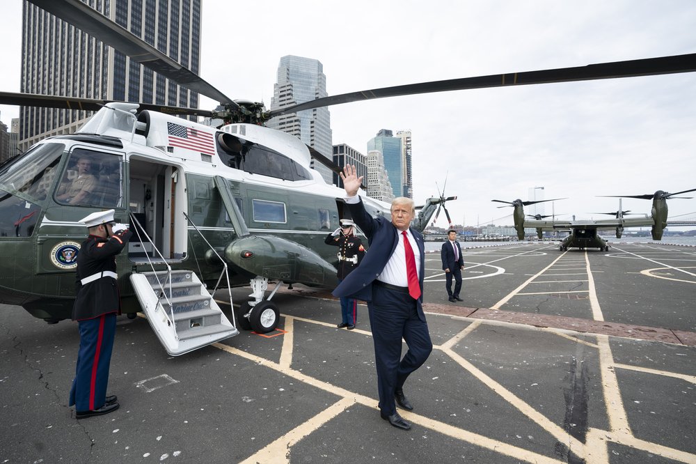 President Trump stepping out of a helicopter.