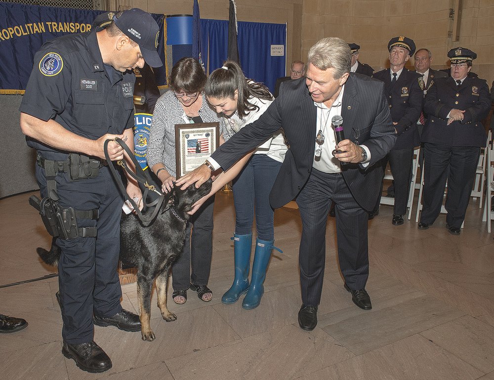 The family of late Specialist Matthew E. Baylis with MTA Police Officer Eric Heimbauer and Matty