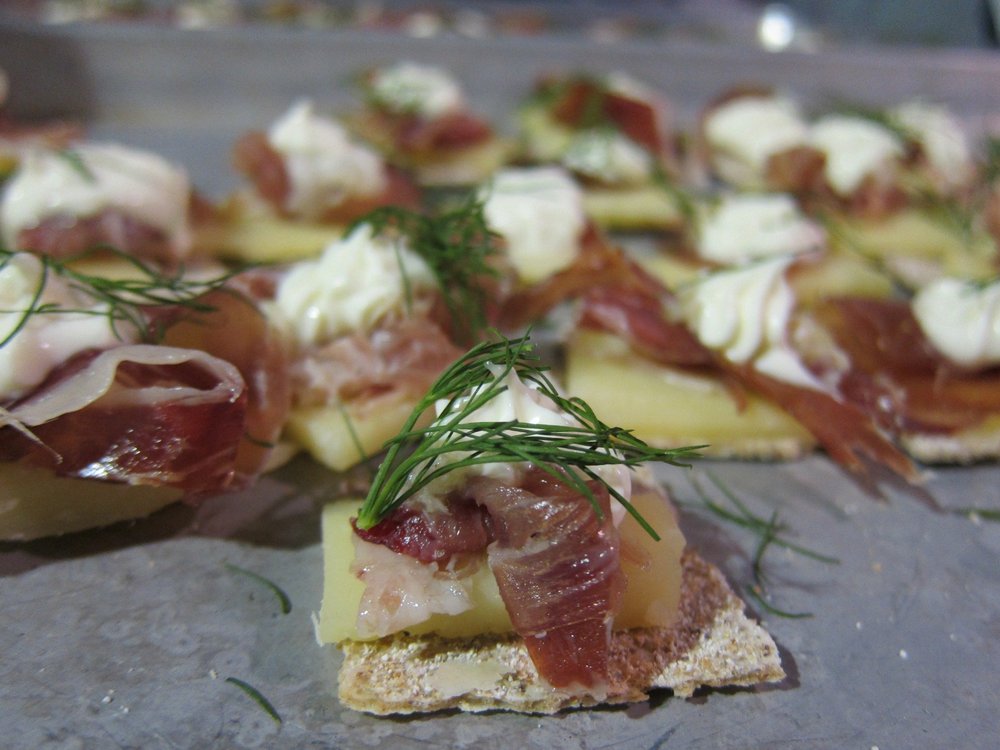 50a854357.jpeg "12 month Gruyere AOP with Vermont Creamery Creme Fraiche mixed Batampte horseradish, La Quercia speck, fresh dill-all to be served on a vegetable crisp," from Jeremy Jackson, Central Market Westgate, Austin<br>