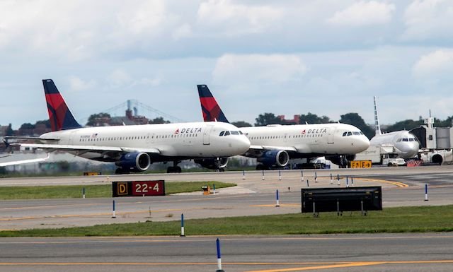 Delta airplanes pictured at LaGuardia Airport.