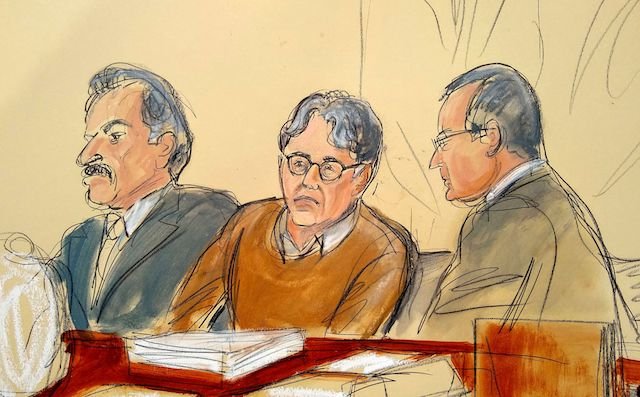 Keith Raniere, pictured with his lawyers, in a courtroom sketch from the first week of the trial.