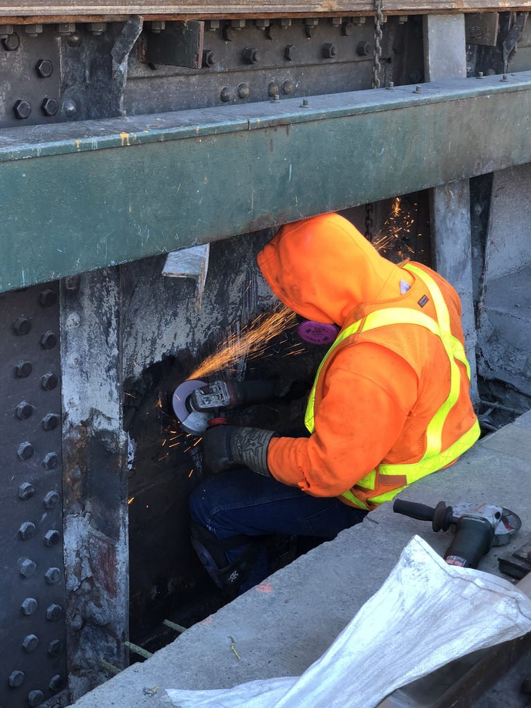 51ab6eccc42240259574_201e6e20d9_b-jpg.jpeg Before photograph of the stations: MTA New York City Transit announced that the 30 Av and 36 Av stations on the Astoria Line reopened for service on June 22, 2018, following successful on-time repairs and improvements that restored and modernized the century-old stations for thousands of customers who use the N/W lines. Here, a worker performs repair work on a track girder.<br>(Marc A. Hermann / MTA New York City Transit)