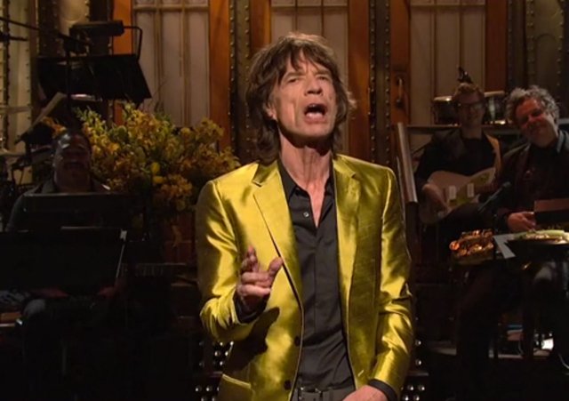 52012snlmonolog.jpg Jagger answers frequently asked questions during the monologue. He loves the Free Credit Report band.