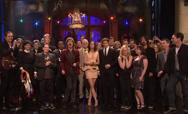 52012wiig3.jpg Jagger and Arcade Fire play "She's A Rainbow" and "Ruby Tuesday" as the cast dances with, and says goodbye to a tearful Kristen Wiig: