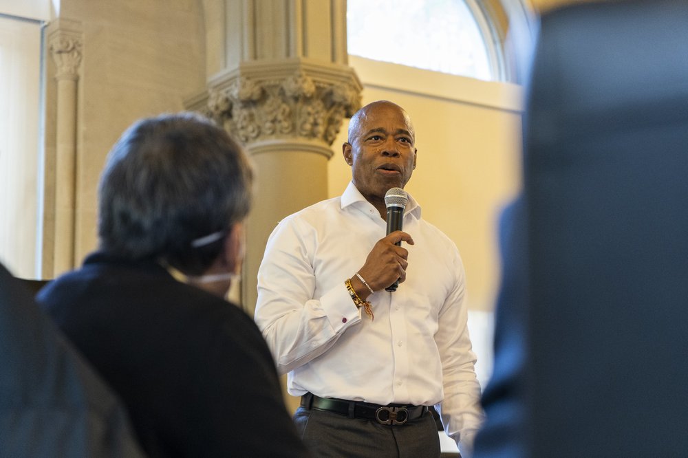 Mayor Eric Adams delivers remarks at a Street Homeless Advocacy Project open house in 2022.