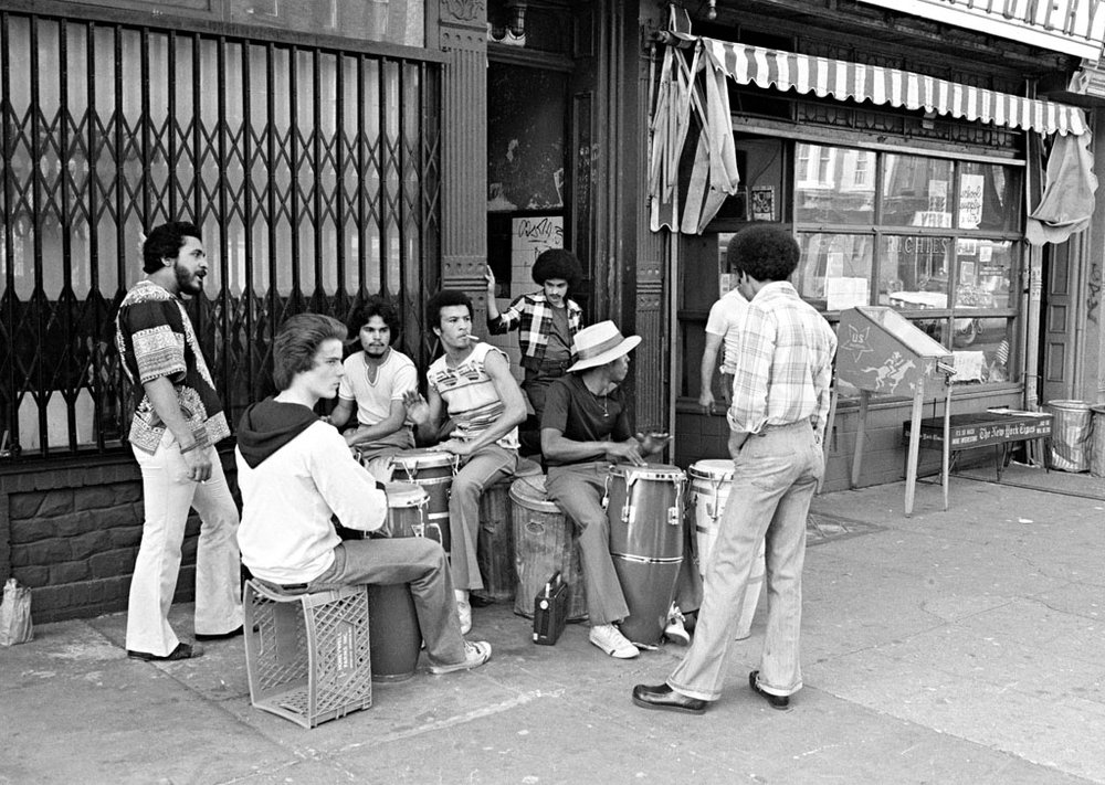 52dce1a71conga-players-7thavenue-1977-jpg.jpeg Conga players on 7th Ave, 1977.<br/>