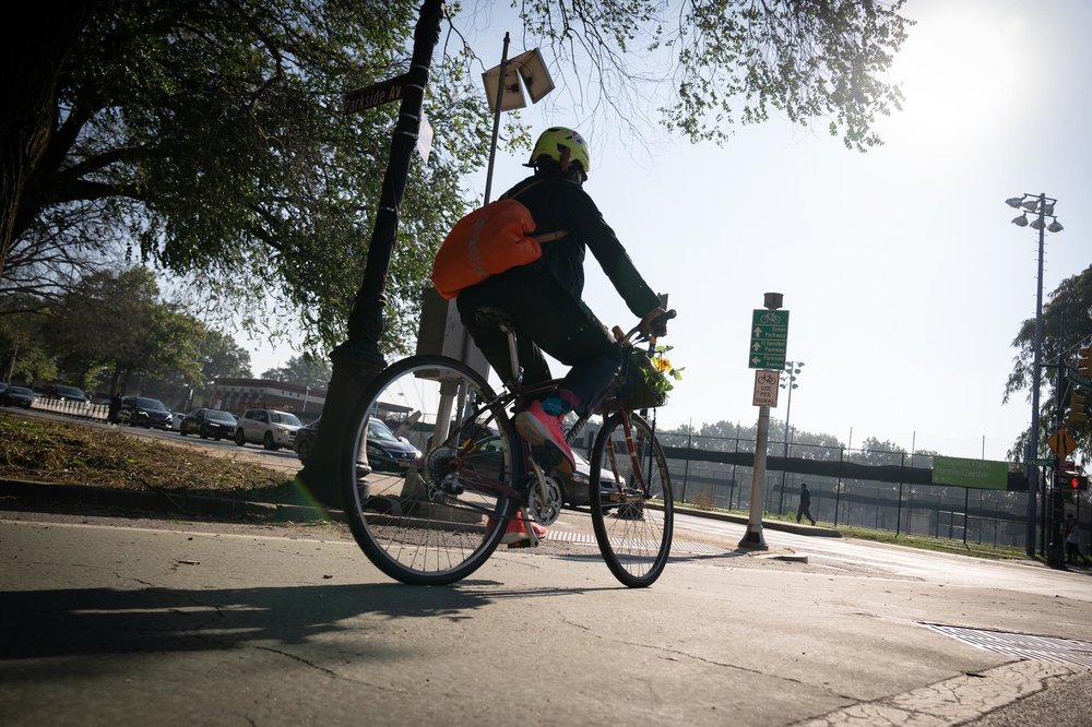 A cyclist rides in Brooklyn.