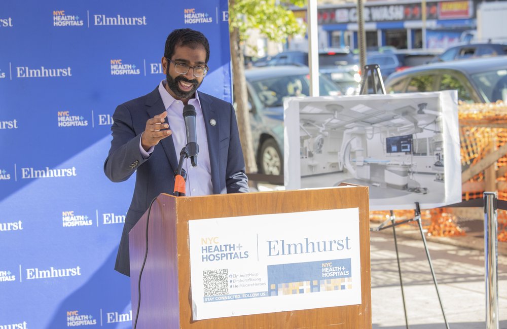 Hospital staffers and New York City lawmakers celebrate a major boost in funding for Elmhurst hospital on Monday, Oct. 23, 2023.