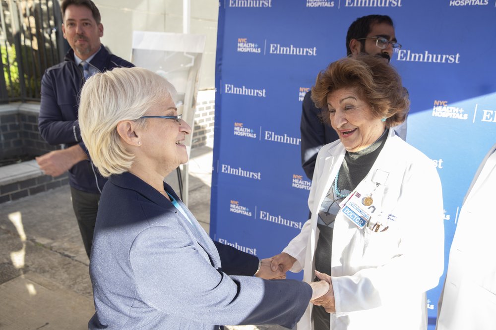 Hospital staffers and New York City lawmakers celebrate a major boost in funding for Elmhurst hospital on Monday, Oct. 23, 2023.