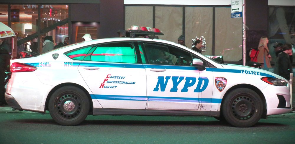 A police cruiser on a New York City street.